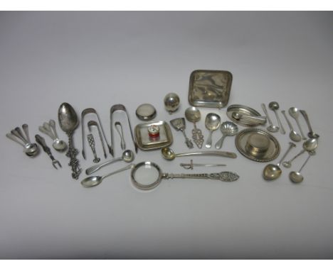 Four various silver Caddy Spoons, Sugar Tongs, Trinket Dishes, Condiment and Teaspoons, Magnifying Glass, enamel Box, etc