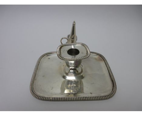 A Victorian silver oblong Chamber Candlestick and Snuffer engraved crest and motto, beaded rim, London 1898