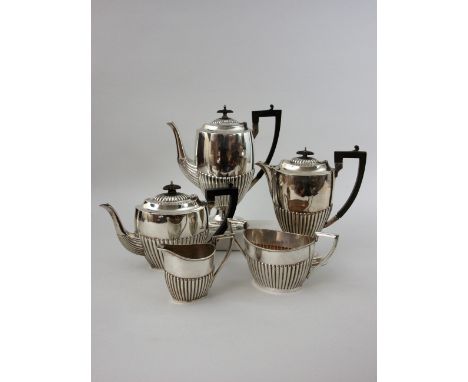 A composite five piece silver Tea and Coffee Service,   Dates and makers including Mappin and Webb, Walker and Hall, 1897, 19