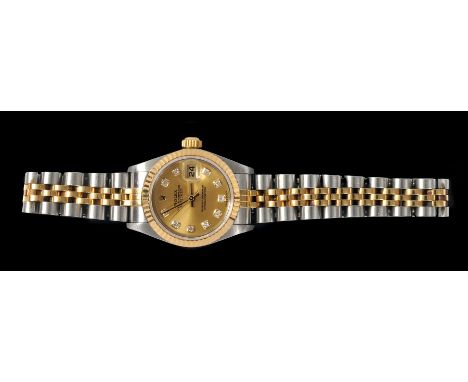 A Lady's Rolex Oyster Perpetual Datejust Wristwatch, the champagne dial with diamond dot markers, sweep seconds hand and date