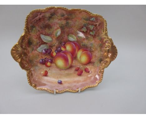 A Royal Worcester shaped square Dish, moulded edge and shell handles, painted plums, cherries and berries on a mossy ground, 