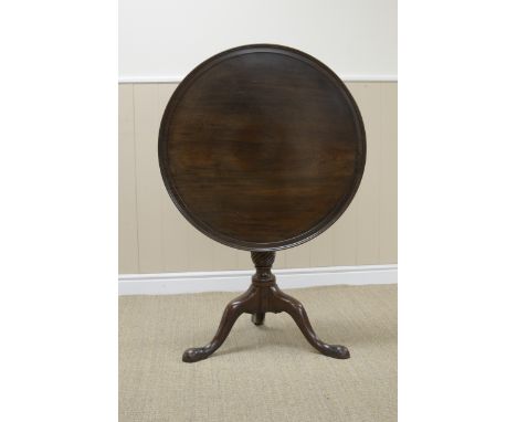 A Georgian mahogany Tripod Table with circular dish top on turned stem with fluted column and shaped tripod base, 2ft 4in D