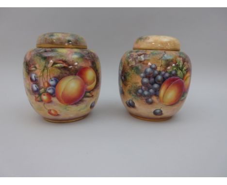 A pair of Royal Worcester Ginger Jars and Covers with domed tops, painted peaches, apples, pears, grapes and berries, signed 