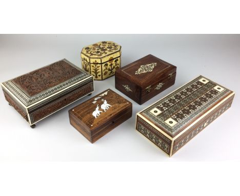 Five various Indian Boxes, 19th/early 20th Century,Including a Bombay carved box the lid decorated with Krishna playing his f