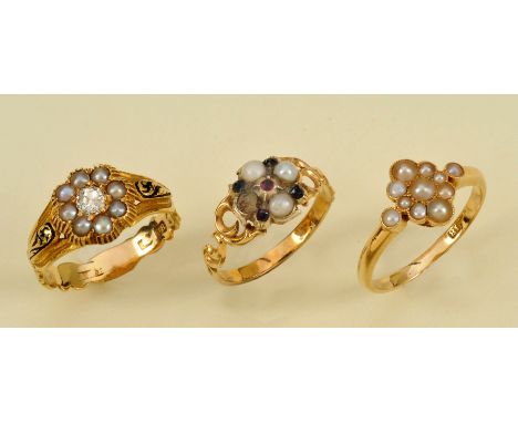 A Diamond, Seed Pearl and Enamel Ring pavé-set old-cut diamond within eight seed pearls, black enamel to shoulders in 18ct go