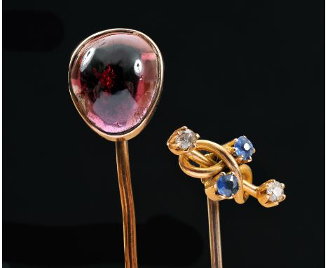 A Garnet Stick Pin set cabochon and a Sapphire and Diamond Stick Pin claw-set two round sapphires and two old-cut diamonds, s