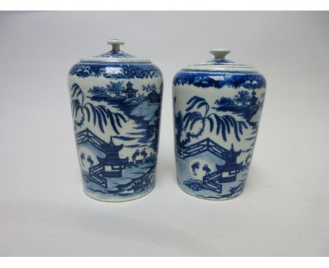 A near pair of Worcester blue and white Tea Caddies and Covers printed temple pattern, 4 1/4in, workman's mark, slight height