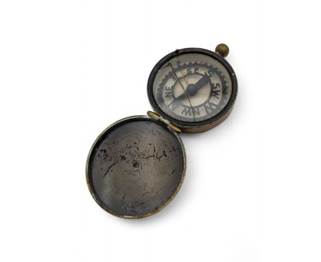 Early 20th century brass pocket compass by Negretti & Zambra, with personal engraving to front cover to 'Trooper E.O Robotham