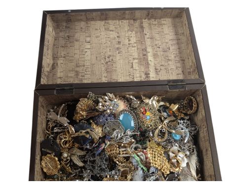 Collection of costume brooches, including ceramic, novelty and animal examples, contained within an Angel jewellery box