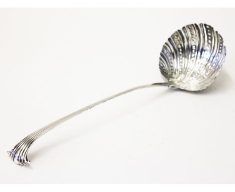 A Georgian hallmarked silver ladle. Wt. 5oz. L34cm