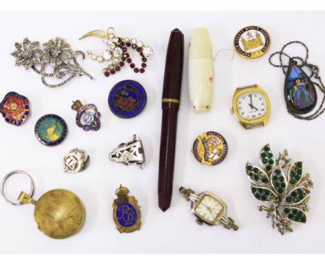 A mixed lot to include enamel badges etc.