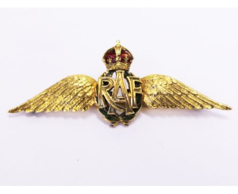 A 9ct gold and enamel RAF ÔwingsÕ lapel badge. Gross wt. 5.7g. L5cm