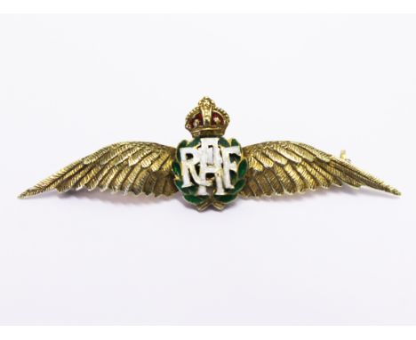 A 15ct. gold and enamel RAF ÔwingsÕ lapel badge. Gross wt. 4g. L5.2cm