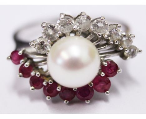 An 18ct gold diamond ruby and pearl ring. Gross wt. 5.6g. Size O