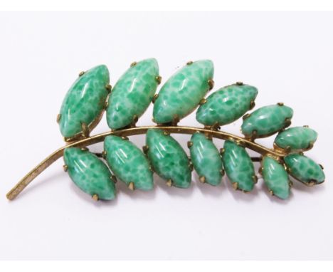 A yellow metal and jade brooch. L5.5cm