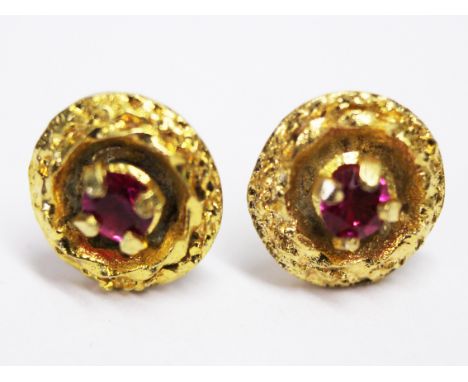 A pair of yellow metal ruby earrings. Wt. 2.1g