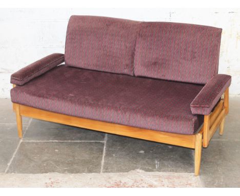 A beech frame retro day bed with adjustable arms and backs. L142cm