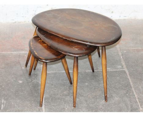 A nest of Ercol &Ograve;pebble&Oacute; tables
&nbsp;
Condition gererally a little worn, no deep scratches but marks to tops a