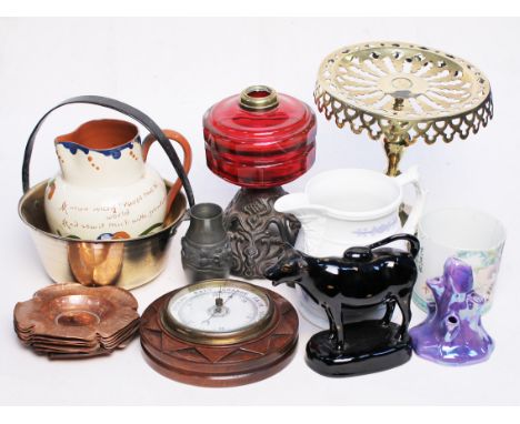 A mixed lot to include a brass trivet, a jam pan, a barometer, an oil lamp and various pottery items