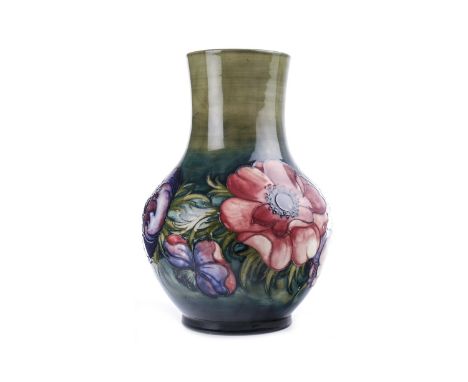 MOORCROFT 'ANEMONE' PATTERN VASE of baluster form, tubelined with anemones on a green ground, impressed and signed marks to b