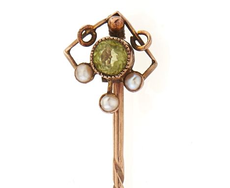 A gold peridot and pearl set stick pin, marked 9ct, 1g  