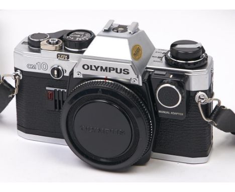 An Olympus OM10 SLR film camera body, with manual adaptor  In apparently working order, good condition