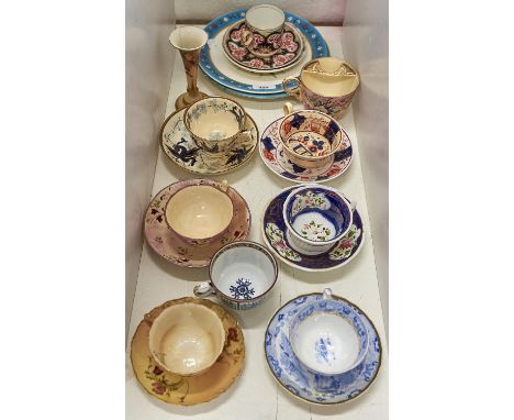 A Royal Worcester cabinet cup and saucer, printed and painted with flowers on a shaded apricot ground, a Royal Worcester spil