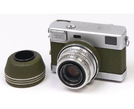 An olive green Zeiss Werra 4 35mm camera, with Carl Zeiss Jena Tessar 50mm F2.8 lens, original case  In apparently working or