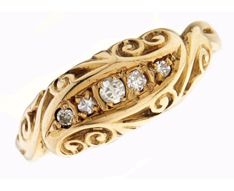 A five stone diamond ring, scroll set in 18ct gold, Birmingham 1918, 3.1g, size N½  Light wear; one of the smallest diamonds 