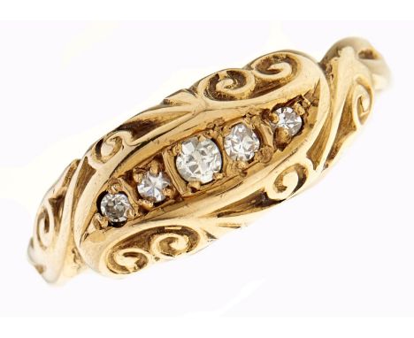 A five stone diamond ring, scroll set in 18ct gold, Birmingham 1918, 3.1g, size N½  Light wear; one of the smallest diamonds 