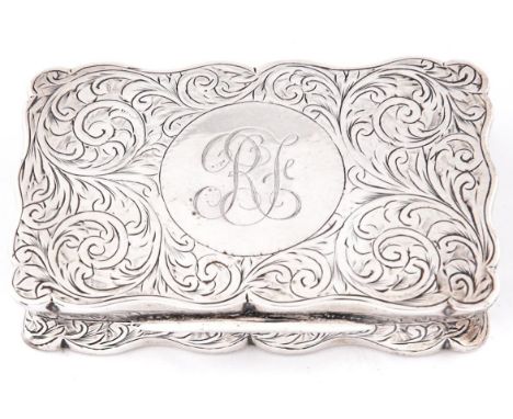 An Edwardian silver snuff box, of scrolling outline with waisted sides and engraved with foliage, 75mm l, by George Randle, B