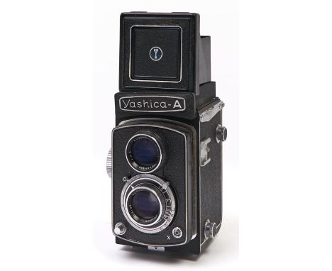 A Yashica-A twin lens reflex camera, with Yashikor 80mm F3.5 lens, with original case  In apparently working order, wear cons