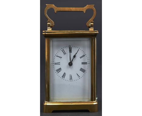 A French brass carriage timepiece, early 20th c, with enamel dial, 11cm h excluding handle  Working order running when wound,