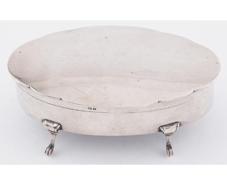 A George V oval silver trinket box, with slightly domed scalloped lid, 9 x 15cm, by Walker &amp; Hall, Birmingham 1918  Light