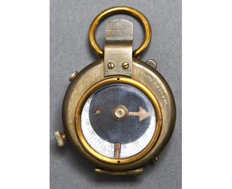 A World War I British prismatic compass, by Ed Koehng 1915, leather case, case dated 1916 