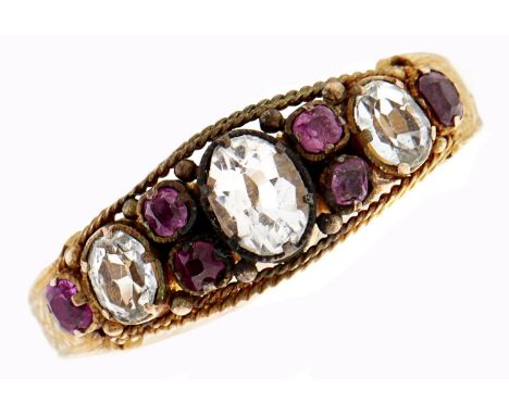 A Victorian amethyst and beryl ring, in 18ct gold, with chased shoulders, indistinctly marked, 2g, size I½  Discreet old sold