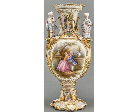 A French porcelain vase, c1870, with polychrome biscuit porcelain boy and girl figural handles, painted with young lovers in 