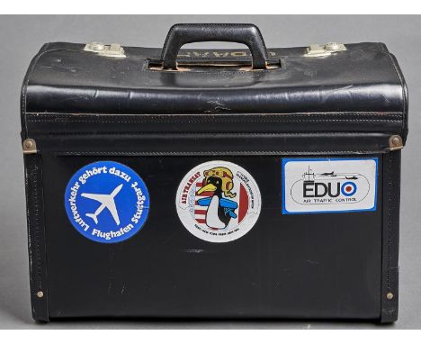 Flying. An aircraft pilot's black leather flight case, c1970/80, the lid painted G-BAAP, containing three Jeppesen black leat