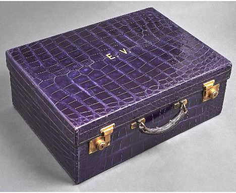 A fine silver fitted purple crocodile hide dressing case by Drew &amp; Sons, retaining the full compliment of silver mounted,