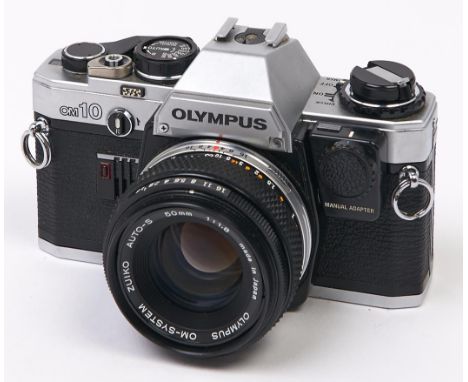 An Olympus OM10 SLR 35mm camera body, with manual adaptor and Olympus OM-System 50mm F1.8 lens  In apparently working order, 