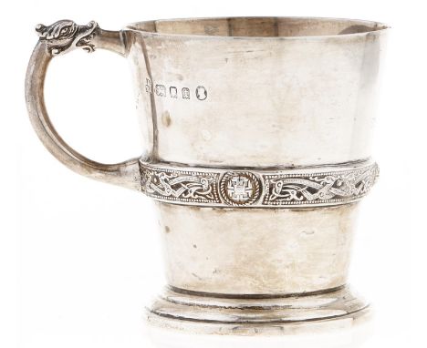 A George V silver christening mug,&nbsp;with girdle of Celtic strapwork, 7cm h, London 1934, 4ozs  Minor dent and light wear