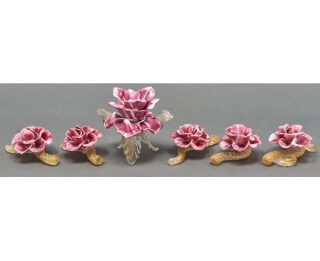 A set of six Venetian glass flower table ornaments, second half 20th c, in the form of a rose, including a larger candlestick