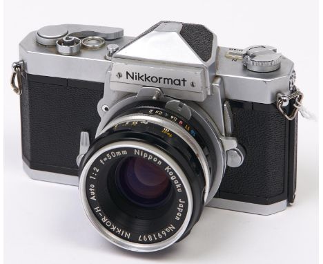 A Nikon Nikkormat FTN SLR camera, with Nikkor-H 50mm F2 lens  In apparently working order, good condition, lens could benefit