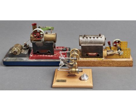 A Bohm Stirling model hot air engine,&nbsp;on varnished lightwood base, 12.5cm h and two Meccano stationery steam engines (3)