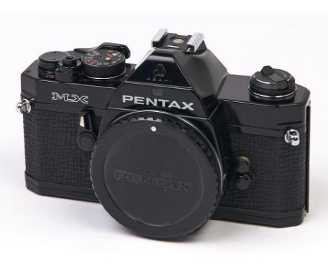 A Pentax MX SLR film camera body, with body cap, original box  In apparently working order, good condition