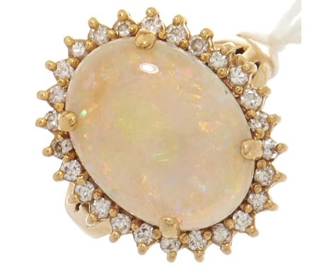 An 18ct gold opal and diamond ring, 0.1g, size O  