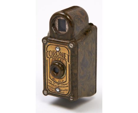 A Coronet Midget Sub-Mini 16mm camera, of olive green Bakelite, Birmingham, c1935  In apparently working order, good conditio