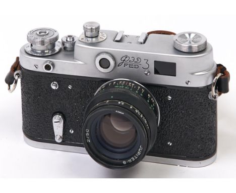 A Soviet Russian FED 3 35mm camera, with Jupiter-8 50mm F2 lens, front lens cap and body cap  In apparently working order, we