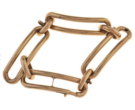 A gold bracelet, mid 20th c, of four long curved buckle shaped links, 19cm l, indistinctly marked, 19.2g  Tiny localised dama