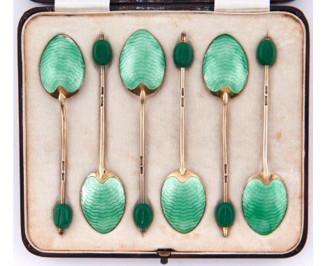 A set of six Edward VIII silver gilt and apple green guilloche enamel coffee spoons, bean terminal, by Turner and Simpson, Bi